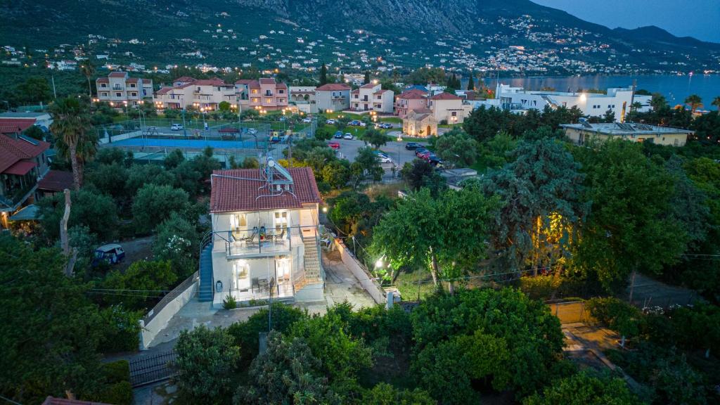 Aerial view of Planet Seaside Apartments in Kalamata, Greece, showcasing five studios with the inviting Kalamata beach just 150 meters away